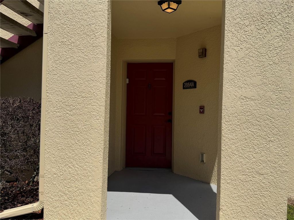 Photo of 2864 Club Cortile Cir #A, Kissimmee, FL 34746 (MLS # S5147015)