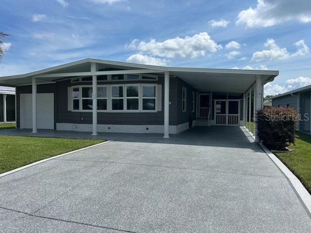 Photo of 5652 Arrowhead Drive, Zephyrhills, FL 33542 (MLS # J993561)