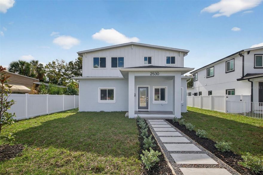 St. Pete Heights Stunner! Welcome to this exceptional BRAND-NEW CONSTRUCTION by BAY AREA BUILDS, ideally located in a NON-FLOOD ZONE in the heart of St. Pete Heights. Thoughtfully designed for modern living, this beautifully crafted residence offers 4 spacious bedrooms and 3.5 baths with a functional, well-planned layout and abundant storage throughout. Designed with entertaining in mind, the open-concept kitchen features all-wood cabinetry, striking calcite countertops, stainless steel appliances, and a generous walk-in pantry—perfect for both everyday living and hosting guests. Elegant tilework and curated designer finishes elevate the space, creating a polished and cohesive aesthetic. The FIRST FLOOR PRIMARY SUITE is impressively sized and offers a walk-in closet with custom shelving, along with a spa-inspired bath complete with an oversized soaking tub and a walk-through shower. Upstairs, you’ll find an additional en-suite bedroom featuring double vanities, a beautifully tiled shower, and a walk-in closet. Two more upstairs bedrooms are equally spacious and versatile, ideal for guests, family, or a home office. Convenience is key with TWO LAUNDRY ROOMS, providing flexibility and ease for multi-level living. Additional highlights include a one-car garage with alley access and additional off-street parking, ample storage throughout the home, a layout that maximizes both privacy and functionality and a builders 2-10 Home Warranty. Situated in a non-flood zone, this home offers peace of mind along with refined design and quality craftsmanship. A rare opportunity to own a stylish, move-in-ready new construction just minutes from downtown St. Pete, parks, shopping, dining, and more.