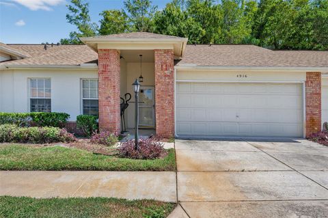 Photo of 4916 Troon Lane, New Port Richey, FL 34655 (MLS # TB8430019) Photo of 4916 Troon Lane, New Port Richey, FL 34655 (MLS # TB8430019)