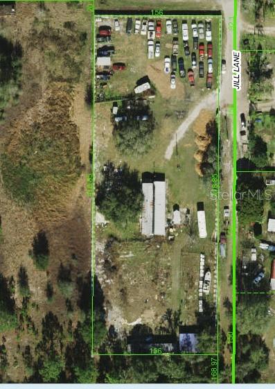 Discover this 1.50-acre fully fenced property in Zephyrhills, conveniently located near US-98 North and just minutes from town. The land already has essential utilities in place, including electricity, a functioning septic system, and two wells—one currently operational.
The property features two mobile homes. While they are not currently habitable, with some repairs and updates, they could be restored for use. One of the mobile homes is presently rented on a month-to-month basis, offering potential rental income.
This is a great opportunity for investors, builders, or anyone looking to create their own space in a prime location with easy access to shopping, dining, and major roadways.