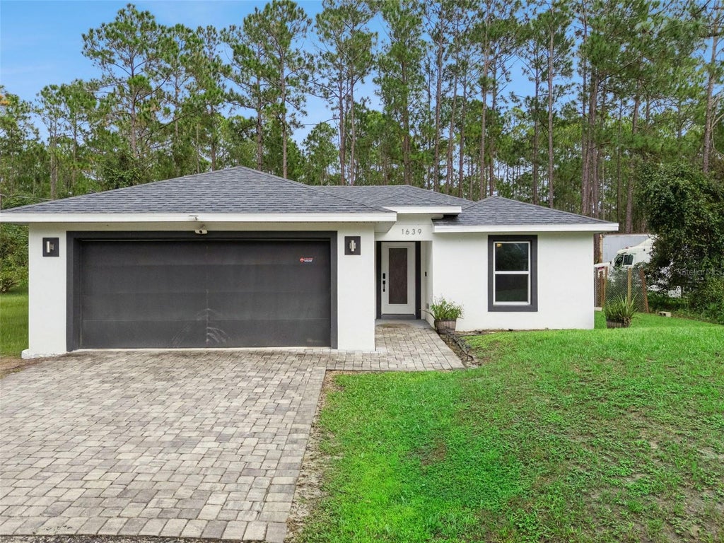 Photo of 1639 11th Avenue, Deland, FL 32724 (MLS # V4951506)