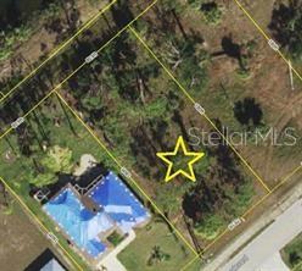 Photo of 413 Boundary Boulevard, Rotonda West, FL 33947 (MLS # D6144741)