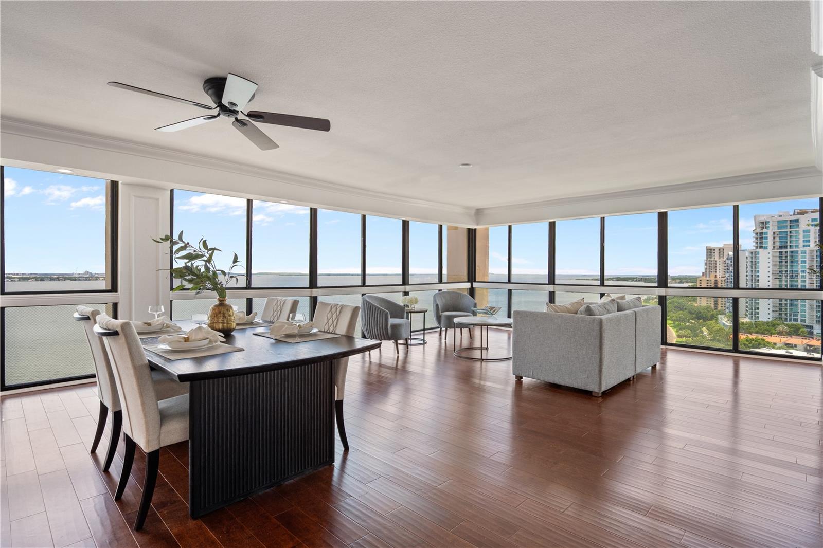 The pinnacle of high-rise luxury living, this exquisite residence is nestled within the iconic Monte Carlo Towers, one of South Tampa’s most distinguished addresses. This sprawling condo features over 3,000 square feet of living space, 19 stories in the sky and features three generously appointed bedrooms and three elegantly designed bathrooms, all showcasing timeless sophistication and breathtaking views that stretch from the sparkling waters of Tampa Bay to the gorgeous downtown skyline. A private elevator delivers you directly into the residence, where you’re welcomed by an open-concept floorplan, expansive living and dining areas, and floor-to-ceiling windows that bathe the interiors in natural light while framing unparalleled panoramic views. The gourmet kitchen is a refined culinary space, complete with custom cabinetry, premium appliances, a butler’s pantry, and an inviting breakfast nook with dramatic bay views. The primary suite is a serene retreat, offering a spa-inspired bathroom with a glass-enclosed shower and an oversized walk-in closet. Each additional bedroom offers its own ensuite bath, creating private, elevated comfort for guests. Thoughtful upgrades and conveniences include two parking spaces, dual private trash chutes, and a brand-new AC system installed in 2024. Just outside your door, the Monte Carlo lifestyle awaits, resort-style amenities include a bayfront pool surrounded by lush landscaping, a state-of-the-art fitness center, pickleball courts, clubroom, library, and 24-hour concierge service. Located directly across from the longest continuous sidewalk in the world, the iconic Bayshore Boulevard; you are moments from the city’s finest dining, shopping, and cultural attractions including Downtown, Amalie Arena, Hyde Park Village, Tampa's Riverwalk, Channelside, and Tampa's International Airport. This is more than a home, it’s an exceptional expression of elegance, exclusivity, and effortless waterfront living.