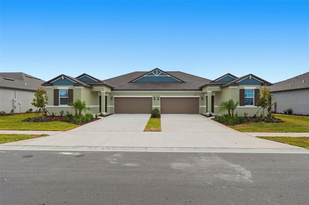 Photo of 9222 Scouter Bee Pl, Land O Lakes, FL 34637 (MLS # J996776)