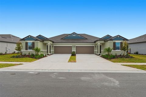 Photo of 9222 Scouter Bee Pl, Land O Lakes, FL 34637 (MLS # J996776)