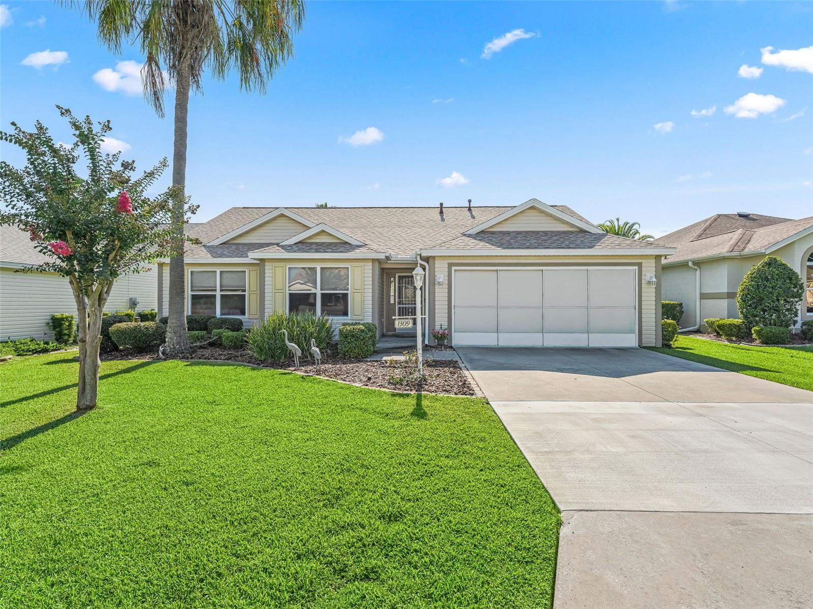 BOND has been PAID. Located on a quiet CUL DE SAC street with only twelve houses across from the 5th tee of the El Santiago executive golf course, in the Village of Santiago, this lovely DESIGNER floor plan (Alachua/Whispering Pine) is a 3/2 (the third room is being used as a study/den and has no closet). ROOF replaced in November 2021, interior painted in October 2021, carpet in living room, dining room and primary bedroom replaced in October 2021. VOLUME CEILINGS, Pull Out shelving in the Spacious Kitchen with Stainless Steel Appliances, Spacious Primary Bedroom En Suite with dual sink vanities and spacious Walk In Closet. Covered and screened lanai with PRIVACY in rear since the house has LOTS of SPACE behind with plenty of ROOM for a POOL, and privacy landscaping. Not to mention LOCATION, LOCATION, LOCATION...close to the Savannah Center, El Santiago and El Diablo executive golf courses, the EL SANTIAGO Recreation Center. Convenient to the Spanish Springs Towne Square, Glenview County Club, CR 466 and all the amenities that the Southern Trace area has to enjoy including Hobby Lobby and Costco. Not far from Sumter Landing Market Square. You can enjoy all of the activities, established restaurants, grocery stores, banks, shopping and so much more. This is a MUST SEE and when you do you will want to make this house YOUR home.