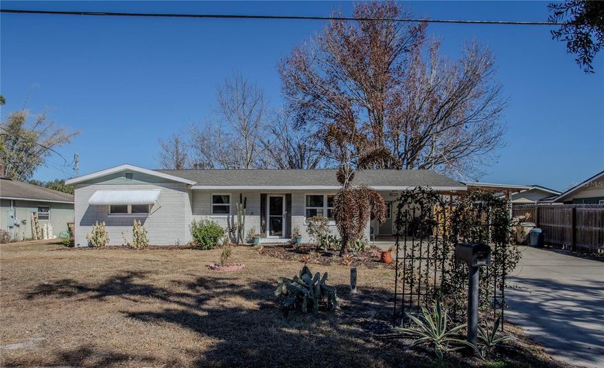 WELCOME to this beautiful, remodeled home conveniently located to shopping, restaurants, Tavares, Mount Dora, and Leesburg. This hidden community is in SPARKS VILLAGE a well-established neighborhood with a boat ramp & access to Lake Harris and the Chain of Lakes with no HOA fees!  Bring your boat ENJOY THE COMMUNITY BOAT RAMP located right down the street! At the end of the day, trailer your boat right back home! With no HOA restrictions, storing your boat could not be easier! A well-maintained, recently renovated concrete block 3-bedroom 3-bathroom home with a spacious living area, kitchen, bedrooms, laundry room and Florida room under air and heat. The Carport offers access to the homes side door for easy entrance to the kitchen with your groceries.  A big fenced in private backyard creates a private oasis for you to enjoy. Includes a large shed and garage that has electrical power that allows flexibility to be used as a studio or workshop. Upgrades- Windows 2022, Roof 2022, Kitchen 2025, Replaced Well 2022, Front Door 2025, Flooring 2026. The amazing waters of Lake Harris and the Chain of Lakes, with approximately 75,000 acres of aquatic adventures! Enjoy all water recreational activities such as boating, fishing, water sports and more, right at your doorstep. Plus, no HOA provides you with the freedom to personalize your property as you see fit. Short-term rental or long-term rental possibilities adds the option of becoming an income producing property as well! This home is near to shopping, dining, Historic Downtown Mount Dora, the Villages, Orlando, and tourist attractions. East and West coast beaches are only a little over an hour drive away. You really can have it all!