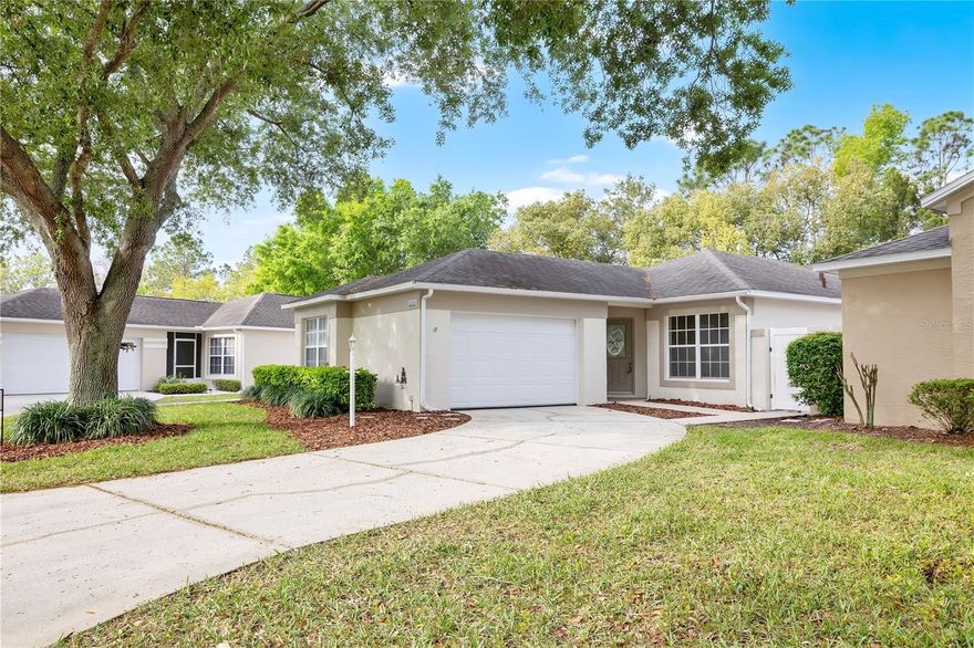 Step into refined living with this thoughtfully renovated Clermont residence, located in Kings Ridge, a 55+ golf club community. Modern upgrades meet everyday comfort in this home, which showcases brand-new appliances, including a washer and dryer, new backsplash in the kitchen to complement the Corian countertops, roof was replaced in 2017, windows were redone with new springs and moldings, screens recently replaced and the property is complemented by brand new sleek laminate flooring that flows seamlessly throughout. Freshly painted interiors and patio spaces create a crisp, inviting ambiance, while new baseboards, designer lighting, and contemporary ceiling fans elevate the home’s aesthetic. The property sits on an oversized lot with beautiful views from the Master bedroom and lanai and features a beautiful vinyl fence for maximum privacy. Enjoy resort-style living with three heated pools, spas, tennis and pickleball courts, golf, and a vibrant clubhouse offering fitness, billiards, and social events. Monthly fees cover lawn care, irrigation, internet, TV, phone, and exterior painting, making for low-maintenance living. This golf-cart-friendly community provides direct access to Kings Ridge Plaza for shopping and dining and is conveniently located near South Lake Hospital, Lake Louisa State Park, and just 30–45 minutes from Orlando’s attractions and airport. With two golf courses, multiple fitness centers, pools, and spas, Kings Ridge offers an active, convenient, and amenity-rich lifestyle. This isn't just a home, it's a lifestyle....come see it in person and fall in love!