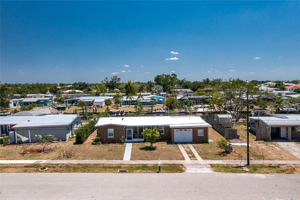 Photo of 159 Godfrey Avenue NE, Port Charlotte, FL 33952 (MLS # C7509324)
