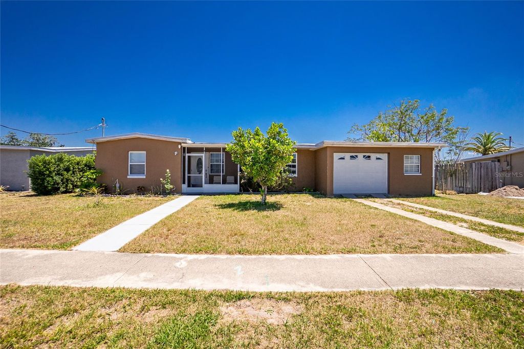 Photo of 159 Godfrey Avenue NE, Port Charlotte, FL 33952 (MLS # C7509324)