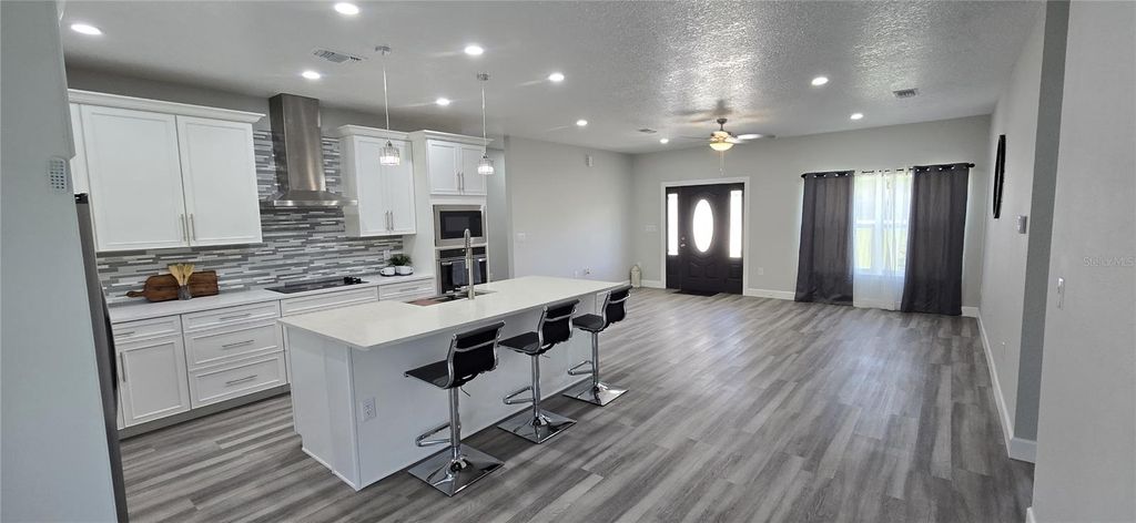 Photo of 32835 Forest Avenue, Leesburg, FL 34788 (MLS # A4686939)