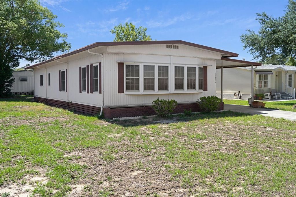 Photo of 15299 Brookridge Boulevard, Brooksville, FL 34613 (MLS # TB8509768)