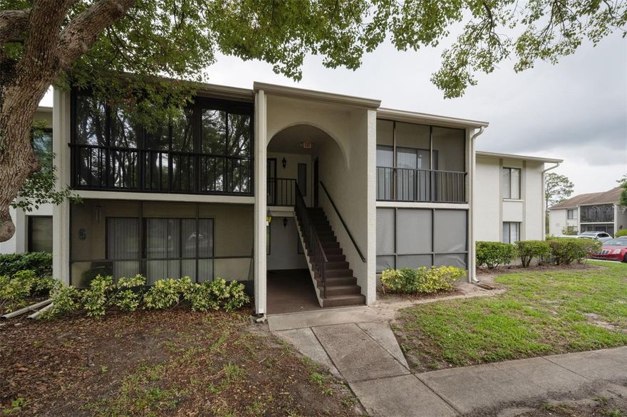 Welcome home to this beautifully maintained 2 Bedrooms, 2 Bath, second floor condo located in the highly desirable 55+ community of Pine Ridge Palm Harbor! This awesome condo offers comfort, convenience, and a beautiful location within the community! This unit offers a spacious, open floor plan designed for comfortable living, tile flooring throughout, and is move-in-ready!  This residence provides easy maintenance and a bright, inviting atmosphere whether you are living her full time or as a second home.   This well-appointed layout offers generous living and dining spaces, while the bedrooms provide privacy for both owners and guests.   The community offers a Resort-style pool, Shuffleboard court and is a Pet Friendly community! Located a short distance from US19 in beautiful Palm Harbor, Florida, everything is close by from Honeymoon Island and Caladesi Island State Park Beaches, the Pinellas Trail, the world-famous Tarpon Springs Sponge Docks which has lots of shopping, boating excursions, and dining! Grocery stores, drug stores, shopping and restaurants are within minutes of this community! Don't miss living the Florida dream.....schedule your showing today before this deal is gone!