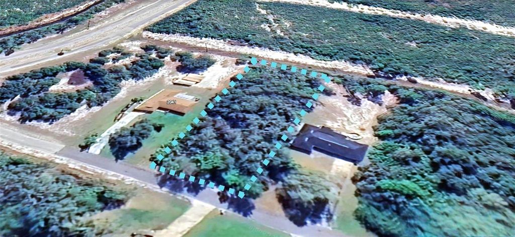 Photo of 5 Allamanda Drive, Indian Lake Estates, FL 33855 (MLS # TB8467273)