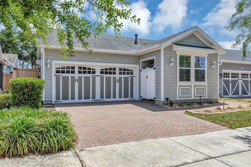 Discover easy, resort-style living in the sought-after Cascades of Groveland(Trilogy)—where active adult living 55+ meets smart upgrades and everyday comfort. This beautifully maintained high on the hill 2-bedroom villa stands out the moment you arrive.
One of its most impressive features is the  20+ fully paid solar panels, delivering remarkable efficiency with an average electric bill of approximately $35/month—a rare and valuable advantage.
Inside, you'll find a bright, open floor plan designed for both entertaining and relaxed living, featuring ceramic tile throughout the main living areas and warm laminate flooring in both bedrooms. The upgraded kitchen is the heart of the home, showcasing granite countertops, stainless steel appliances, 36” cabinets, a gas range, pendant lighting, and a center island ideal for casual dining or morning coffee.
Natural light pours through double-pane windows, while three new Pella doors with built-in blinds add both style and function. Just beyond, your private outdoor retreat awaits—complete with a covered and oversized screened lanai, relaxing hot tub and two smart retractable awnings with LED lighting, and a beautifully landscaped low-maintenance backyard with accent lighting. A separate open-air patio creates the perfect setting for evening wine or dining under the Florida sky.
The flexible bonus space is ideal as a home office, reading room, or cozy TV retreat. Bedrooms are thoughtfully positioned on opposite sides for privacy, with the spacious primary suite offering French doors to the lanai, a custom walk-in closet, linen closet and an ensuite bath featuring a zero-entry glass shower and private water closet.
And the lifestyle? It’s second to none. Residents enjoy access to the incredible amenities of Magnolia House, including indoor and outdoor pools, fitness center, pickleball, tennis, restaurant, bar, card rooms, craft spaces, and a full calendar of social activities. HOA fees include Cable,Internet,Security and more!
If you’ve been waiting for a home that offers efficiency, privacy, upgrades, and an active lifestyle—this villa deserves a spot at the top of your list.