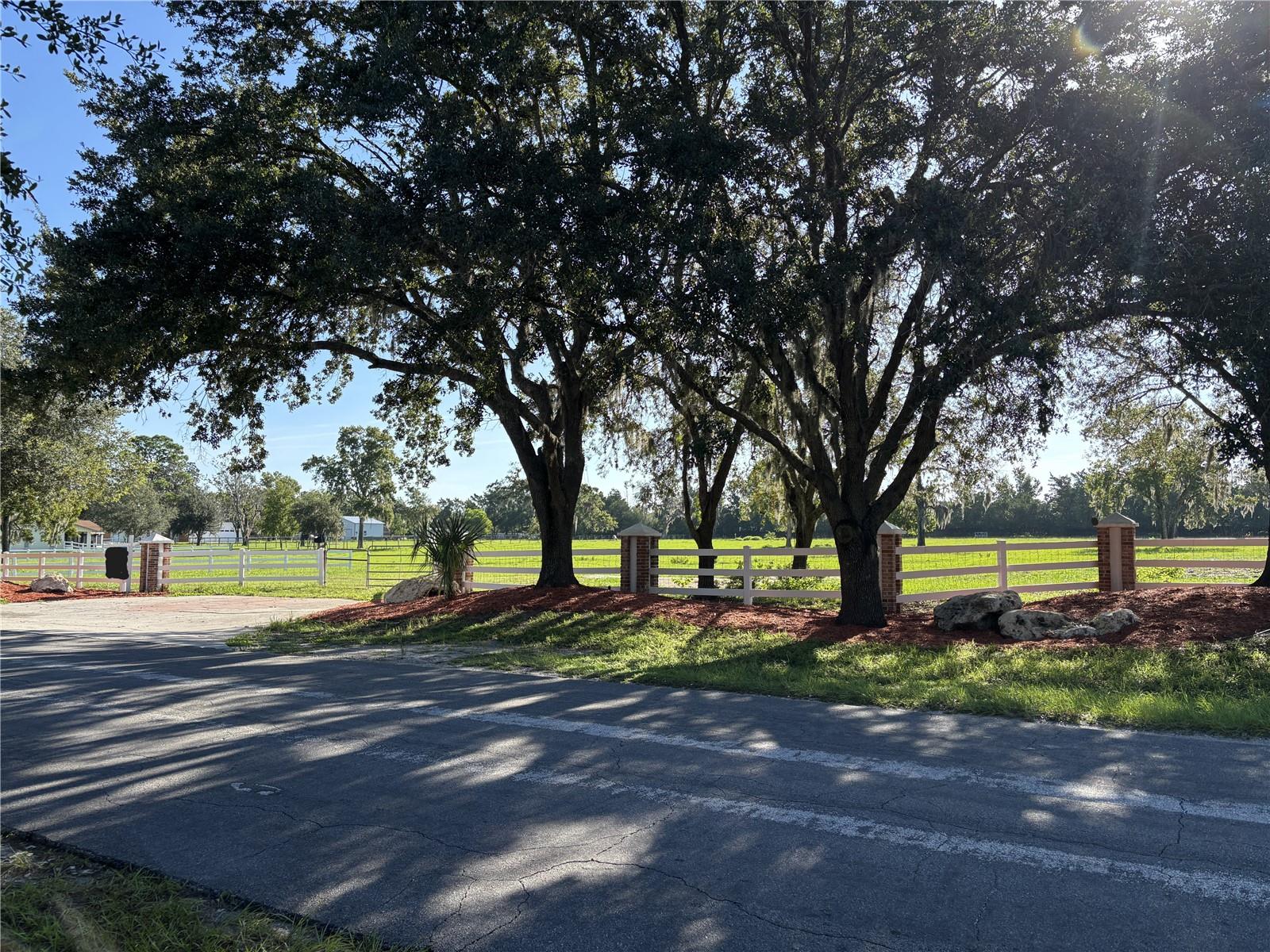 Oakwood Estates Oversized Homesite - This 3.6 Acre Homesite includes Front & Side Vinyl Fencing, Concrete Slab and a .72 Acre Front & Side Easement w/Entry Features that are maintained by the HOA - See attached Easement Agreement for Details. Oakwood Estates is a Deed Restricted Community consisting of 24 Estate Size Tracts (2.5+ Acres), for Site Built Homes Only. These Homesites are Mostly Cleared & Spotted w/Gorgeous Oak Trees, Located on a Paved Road and Minutes to The Suncoast Trail for Hiking/Biking, Schools, Shopping, Restaurants, Medical & The Suncoast Parkway for Easy commute to Tampa/St Pete Areas. Deed Restrictions Allow Horses, Cows & Chickens - Possible Private Financing w/Large Down Payment - Call for more Details!