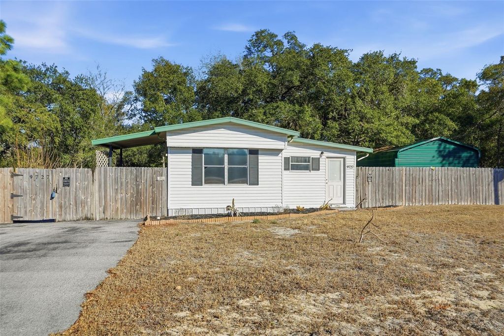 Photo of 9727 Lake Drive, Weeki Wachee, FL 34613 (MLS # W7882468)