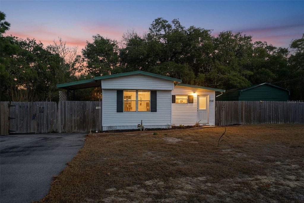 Photo of 9727 Lake Drive, Weeki Wachee, FL 34613 (MLS # W7882468)