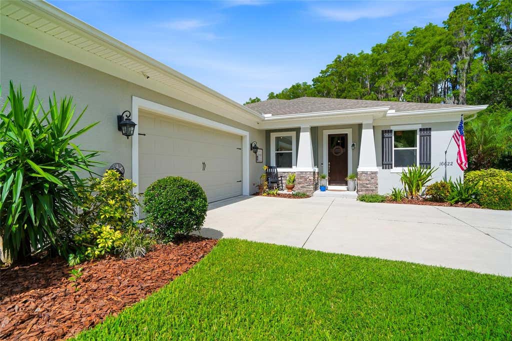 Photo of 16622 Lakeshore Road, Tampa, FL 33624 (MLS # TB8520081)