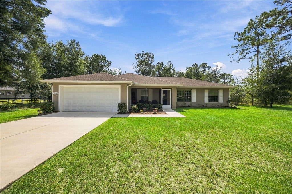 Photo of 12888 SW 98th Street, Dunnellon, FL 34432 (MLS # OM733233)