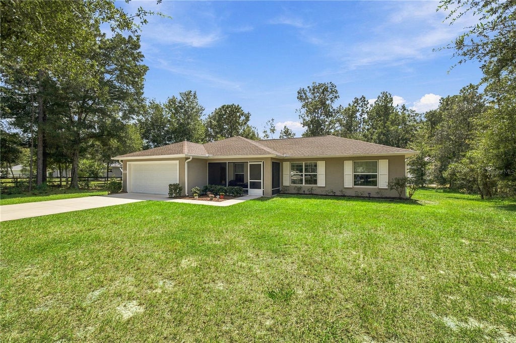 Photo of 12888 SW 98th Street, Dunnellon, FL 34432 (MLS # OM733233)