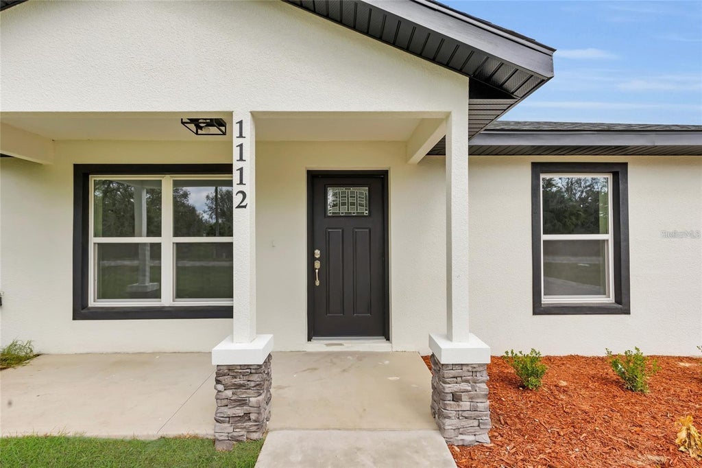 Photo of 14619 SW 21 Place, Ocala, FL 34481 (MLS # OM729265)