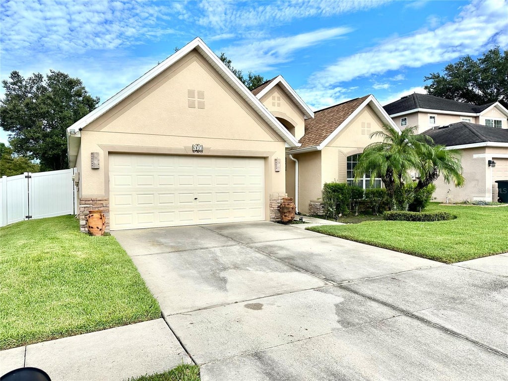 Photo of 6135 Champions Gate Boulevard, Zephyrhills, FL 33541 (MLS # TB8551696)