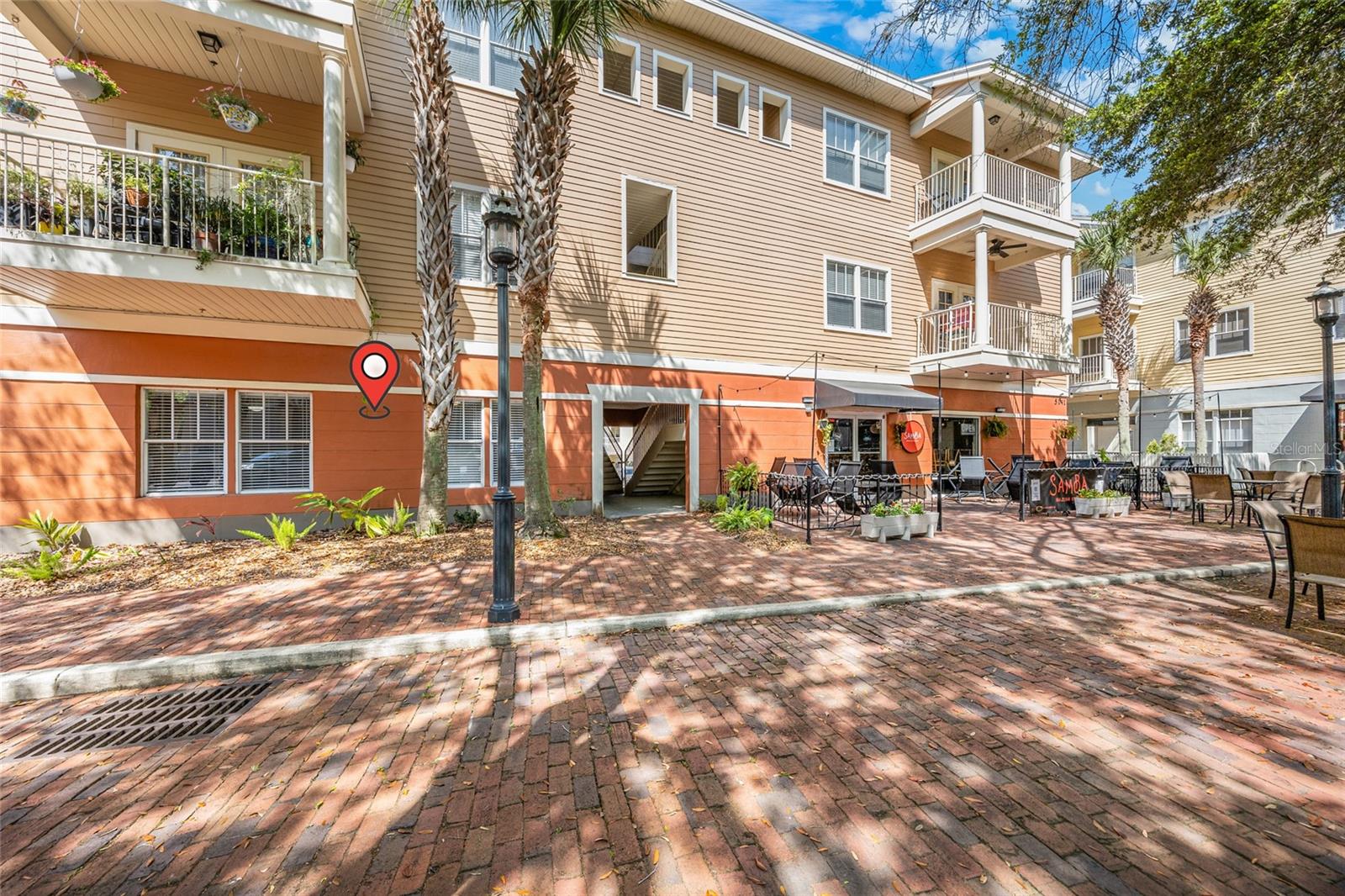Located in the heart of Haile Plantation Village Center, this beautifully designed 2-bedroom, 2-bath condominium offers the perfect blend of comfort and convenience. With 1,088 SF of heated and cooled space, this split -plan home features porcelain tile flooring throughout, elegant stone countertops, and nine-foot ceilings that enhance its spacious feel. The kitchen provides ample storage, and a laundry closet adds to the home’s functionality.
Step outside and immerse yourself in the community’s incredible amenities, including a private pool and fitness center. Enjoy the charm of Haile Village Center, where you’ll find an array of restaurants, boutiques, and year-round festivities. Every Saturday, the local farmer’s market offers fresh produce, dairy, meats, baked goods, and live music, making this a truly special place to call home. For more information about the community, visit online the Village at Haile.