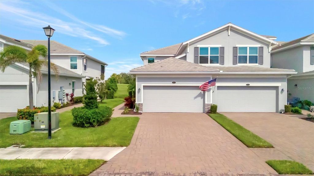 Photo of 947 Tidewater Shores Loop, Bradenton, FL 34208 (MLS # A4660020)