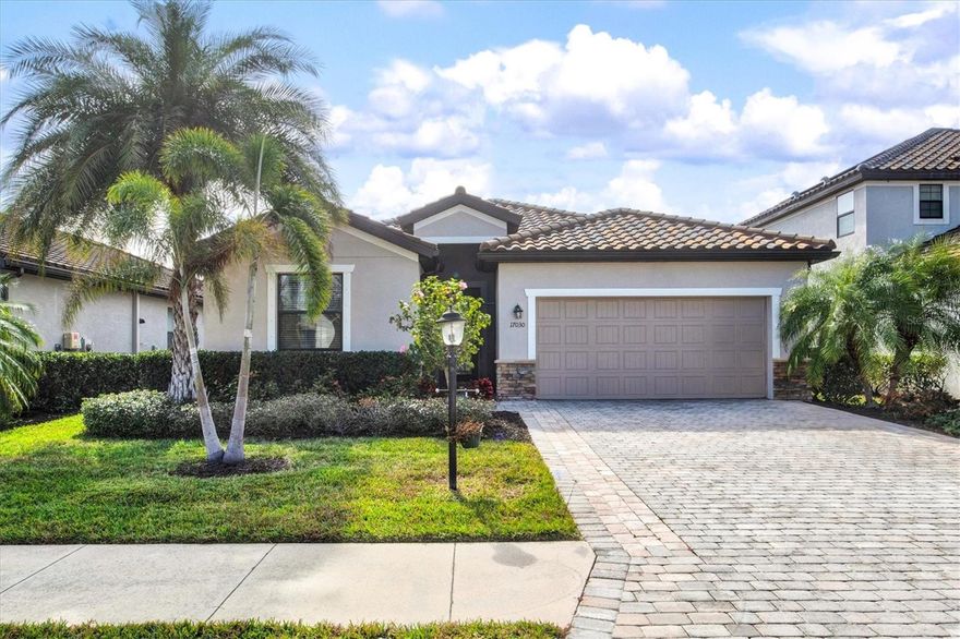 This pristine, single-story pool home with water views offers a bright, open floor plan and 4 bedrooms plus 3 full baths within 2,006 square feet. The well-designed split layout ensures privacy and comfort throughout. Pool & lawn service & community amenities included in Rent. Curb appeal abounds with a striking Barcelona tile roof, an extended paver stone driveway that provides ample parking, and lush, Florida-friendly landscaping that invites you inside. The chef’s kitchen is a true standout, featuring granite countertops, stainless steel appliances, a walk-in pantry, and a spacious island with seating. The open layout seamlessly connects the kitchen to the dining room and great room, creating an ideal space for entertaining and relaxation. The expansive master suite offers a private retreat with a generous walk-in closet and a luxurious en suite bath complete with a dual-sink vanity, oversized walk-in shower, and a separate soaking tub. Elegant design elements throughout the home include upgraded cabinetry, crown molding, and a water softener with reverse osmosis system. Step outside to the stunning backyard, where you'll enjoy a heated saltwater pool and spa, framed by picturesque views of a serene pond — the perfect backdrop for watching Florida’s spectacular sunsets. Polo Run provides a wealth of top-tier amenities, including a modern clubhouse, resort-style heated pool, BBQ area, playground, and sports courts for tennis, pickleball, and basketball. There’s also a dog park, bocce ball courts, and a state-of-the-art fitness center with a dedicated yoga room. Conveniently located near UTC and Downtown Lakewood Ranch’s shops and restaurants, with a grocery store just around the corner, you’re only minutes from shopping, dining, gyms, salons, bars, and some of the best beaches in the country. Sarasota International Airport is a short drive away, and the home is zoned for A-rated schools. There is a one time $125 Tenant Processing Fee due at move in along with rent. Tenant will pay $23 per month for Solar Power service.