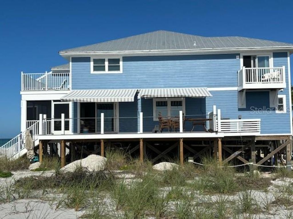 Photo of 221 N Gulf Boulevard #A, Placida, FL 33946 (MLS # D6146245)