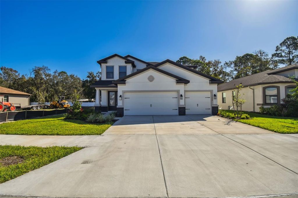 Photo of 11578 Weaver Hollow Road, New Port Richey, FL 34654 (MLS # W7869024)