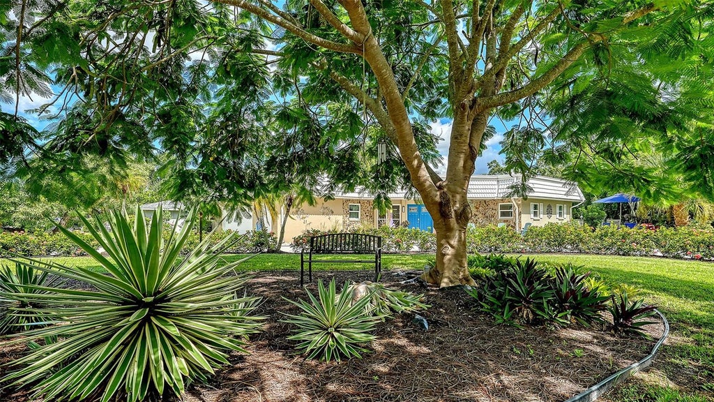 Photo of 5211 Inverness Drive, Sarasota, FL 34243 (MLS # A4705487)