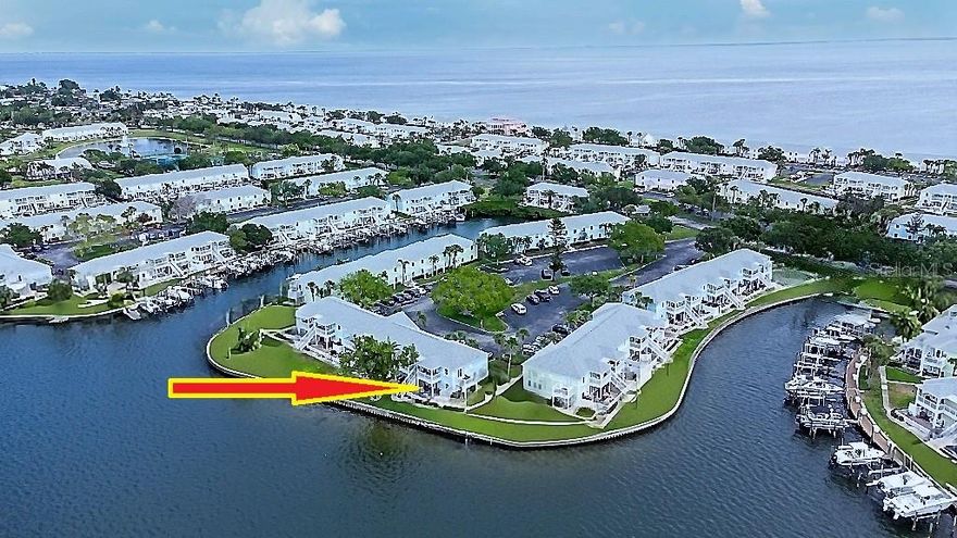 Experience the ultimate in luxury waterfront living at this exquisite condo situated directly on the shimmering waters of Tampa Bay. Nestled within the coveted Boaters Haven community, this exceptional residence offers unmatched access to the bay, allowing you to indulge in aquatic adventures with no bridge crossings required. 

Step inside this meticulously maintained ground-floor unit, where breathtaking waterfront views greet you from not just one, but two spacious patios. Revel in the picturesque sunsets that grace your evenings, painting the horizon in vibrant hues throughout the year. Built to withstand the elements, this home has weathered past hurricanes with grace and strength.

The completely open floor plan invites abundant natural light, courtesy of upgraded windows that illuminate the modern interior. Features include stylishly remodeled cabinetry, sleek appliances, elegant countertops, and sophisticated flooring that harmoniously blend charm with contemporary flair. Every detail has been thoughtfully curated to create an inviting atmosphere, whether you choose to make this your vacation retreat or permanent haven.

The convenience of a built-in laundry closet adds practicality to everyday living, making chores effortless. Set within a gated community that spans 88 acres of pristine waterfront property, residents are treated to a wealth of amenities designed for enjoyment and relaxation. Dive into one of the two heated pools, unwind in the hot tub, or stay active in the fully-equipped gym. Engage in friendly competition on the pickleball, tennis, and volleyball courts, or take advantage of the basketball courts and kayak storage facilities. A fishing dock, billiards room, and a private dog park ensure there's something for everyone to enjoy.

As a delightful bonus, the community features a bar that boasts stunning panoramic views of Tampa Bay—an idyllic setting to sip a cocktail while soaking in the mesmerizing scenery. For those with maritime inclinations, boat slips, garages, and carports are available for rent or purchase once you own a property in this hidden gem.

Convenience extends beyond home with downtown St. Pete just minutes away. Immerse yourself in the vibrant nightlife, savor delectable dining experiences, and explore a rich array of art galleries and museums. When you're yearning for sun and surf, the immaculate shores of St. Pete Beach are only a short drive away.

Embrace the lifestyle of this non-age-restricted, pet-friendly community, designed to provide easy access to major airports for effortless travel. Come home to the serene embrace of waterfront living combined with the urban conveniences of this stunning condo—a perfect sanctuary where sophistication meets serenity.