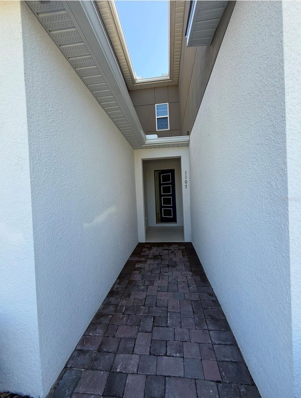 Photo of 1107 Boardwalk Place, Kissimmee, FL 34747 (MLS # S5144974)