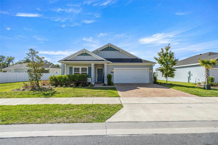 EXPERIENCE A PINNACLE OF MODERN FLORIDA LIVING in this stunning Lennar showcase model nestled within the sought-after Heath Preserve community. Designed with a seamless open-concept floor plan, the heart of the home integrates a spacious great room, a sun-drenched cafe, and a chef-inspired kitchen featuring premium stainless steel appliances, crisp quartz countertops, and a massive walk-in pantry. High-end finishes extend to the versatile flex room and separate retreat, offering endless possibilities for a home office, media lounge, or private fitness studio. Retreat to the luxurious owner’s suite, a private sanctuary boasting an oversized walk-in closet and a spa-like ensuite with dual quartz vanities and a designer-tiled shower. Step through sliding glass doors to a massive covered lanai and an expansive, fully fenced backyard secured by professional white vinyl fencing, providing ultimate privacy for outdoor entertaining or future custom enhancements. This prime location offers unparalleled convenience, situated just minutes from the World Equestrian Center (WEC), top-tier medical facilities, and boutique shopping. With easy access to I-75, renowned golf courses, and a brand-new community pool coming soon, this home perfectly balances luxury and lifestyle. Enjoy a low annual HOA in a blossoming master-planned community designed for those who demand both style and substance. Be sure to check out the 3D tours and floorplans and contact us to schedule your private viewing today!