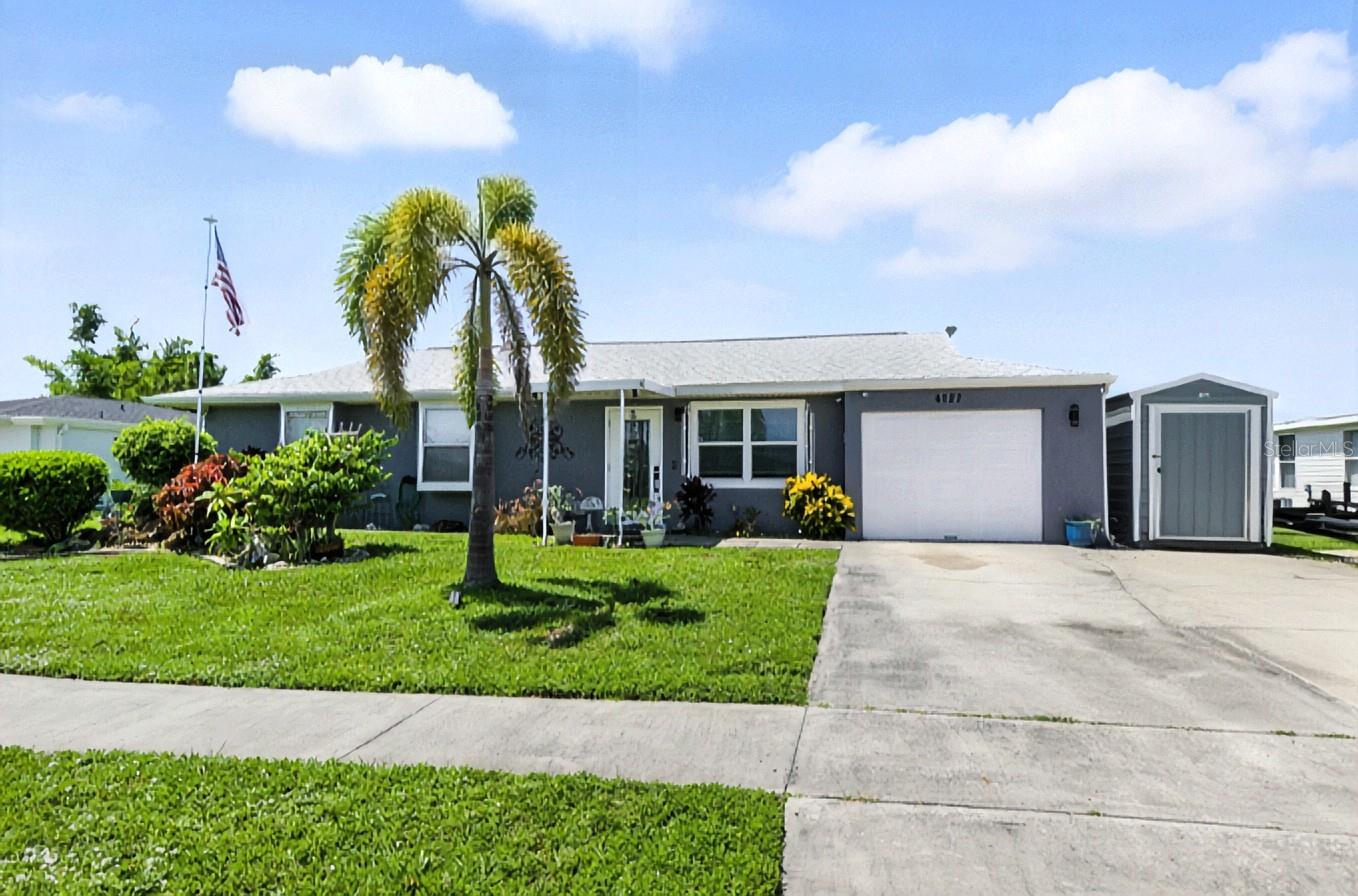 Welcome to your GULF ACCESS waterfront paradise! This rarely available 4-bedroom, 3-bath home boasts exceptional fishing just steps from your back door. Located outside the flood zone and fully updated, this home is ideal for full-time living or seasonal enjoyment.
Property Features:
- Original structure built in 1975 with an expansive ~1,200 sq ft addition, including a second master suite, additional bath, and kitchen area.
- Dual master bedrooms perfect for multi-generational living or guest accommodations.
- Fully remodeled bathrooms that reflect model home quality.
- Recent upgrades: *Brand-new top-of-the-line Daiken 3 1/2 ton air conditioning unit installed July 2025, with 12-year transferable warranty!, new wifi programmable digital thermostat, new roof, updated ceilings, fresh interior/exterior paint, new windows, modern front door, and a generator-ready electrical setup for whole-house power.
Interior Highlights:
- Spacious open living area with formal dining room and canal views.
- Gourmet kitchen featuring granite countertops, solid wood cabinetry, stainless steel appliances, and water views.
- Covered and screened lanai adds functional outdoor living space ideal for entertaining or relaxing.
Outdoor Appeal:
- Beautifully maintained canal-front yard with fruit trees.
- Three versatile storage sheds—perfect for hobbies, gardening, or recreational gear.
- New 10'x20' dock (2020) offers direct fishing and boating access to the Myakka River (approx. 10 minutes), a new customizable floating boat dock so you can walk around your boat. NEW drive-up boat lift, and a 90' seawall. Enjoy the view of the canal from your hot tub.
Location Benefits:
- Within minutes of CoolToday Park (spring training home of the Atlanta Braves), hospitals, dining, gulf beaches, and shopping.
- Set in a friendly neighborhood with welcoming community vibes.
Do not miss your opportunity to own Florida waterfront property with all the upgrades. You are going to want to see this one in person.