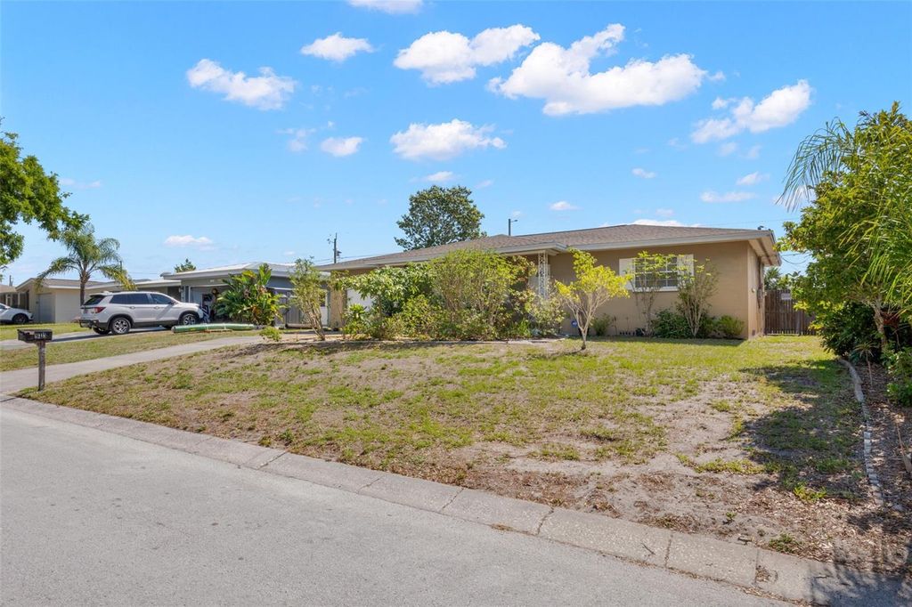 Photo of 909 Woodley Road, Clearwater, FL 33764 (MLS # TB8499816)