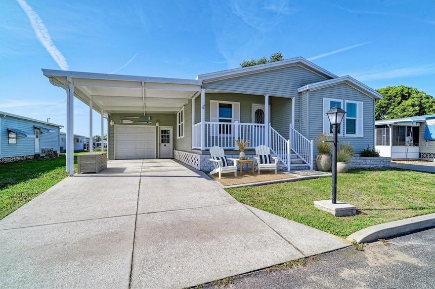 One or more photo(s) has been virtually staged. New roof (2025), AC (2025), IMPACT WINDOWS, Not in flood zone (X), GARAGE & Workshop, carport, Inside Laundry Room. This 3-bedroom, 2-bath home in Bradenton stands out with major upgrades and a rare combination of features in the highly desirable Westwinds Village community. --- Inside, the open floor plan creates a comfortable flow, enhanced by crown molding, engineered hardwood flooring, and new carpet. The oversized kitchen offers an eat-in space with ample cabinetry and workspace, while the split-bedroom layout provides privacy with an en suite bathroom in the primary suite. --- A standout feature is the oversized garage with workshop—rare for this community—along with a large carport built with insulated Elite roof panels, while the home’s exterior is reinforced with OSB sheathing for added structural strength and durability. --- Westwinds Village is a resident-owned 55+ community known for its active lifestyle and strong sense of community, featuring a heated pool, large clubhouse with kitchen and event space, shuffleboard courts, bocce ball, horseshoe pits, billiards and card room, library, and regular social events and activities. --- Conveniently located near shopping, dining, medical facilities, SRQ Airport, I-75, and a short drive to Gulf beaches including Anna Maria Island, this home offers both comfort and accessibility in one of Bradenton’s most well-positioned areas.