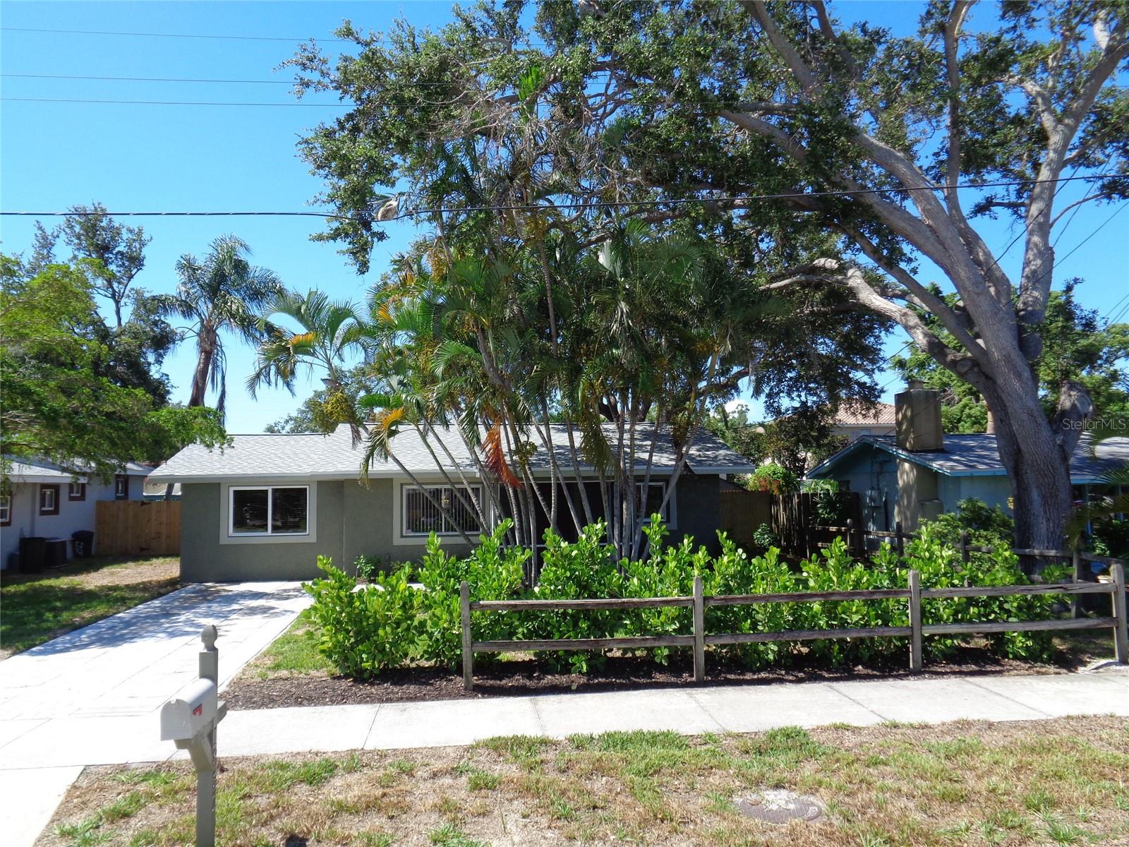 This WEST OF THE TRAIL HOME is a well maintained 3 bedroom, 2 bath single family home is located in a NON-FLOOD ZONE, in the highly sought-after area WEST OF THE TRAIL. Located in walking distance to Walt's Fish Market and Red Rock Park and is within 5 miles of the world-famous Siesta Key Beach! Connors Steak House, Morton's Market, vibrant downtown Sarasota and St. Armand's Circle are less than 7 miles away! Home has an updated kitchen with granite counters and wood cabinets, and several of the rooms have been freshly painted. New landscaping and new irrigation system recently installed. New roof June of (2025), Enjoy sitting out on either the front screened porch or back screened porch and watch the sunset from the spa which is on a concrete slab and "sunk into" a custom designed deck and a fully fenced back yard. No HOA or CDD restrictions and street parking is permitted. This is a perfect home as a primary residence, vacation home, or as an investment property. This would make a great Vacation Rental! Priced to sell! Schedule a showing today! Refrigerators, range/stove & murphy bed do not convey.