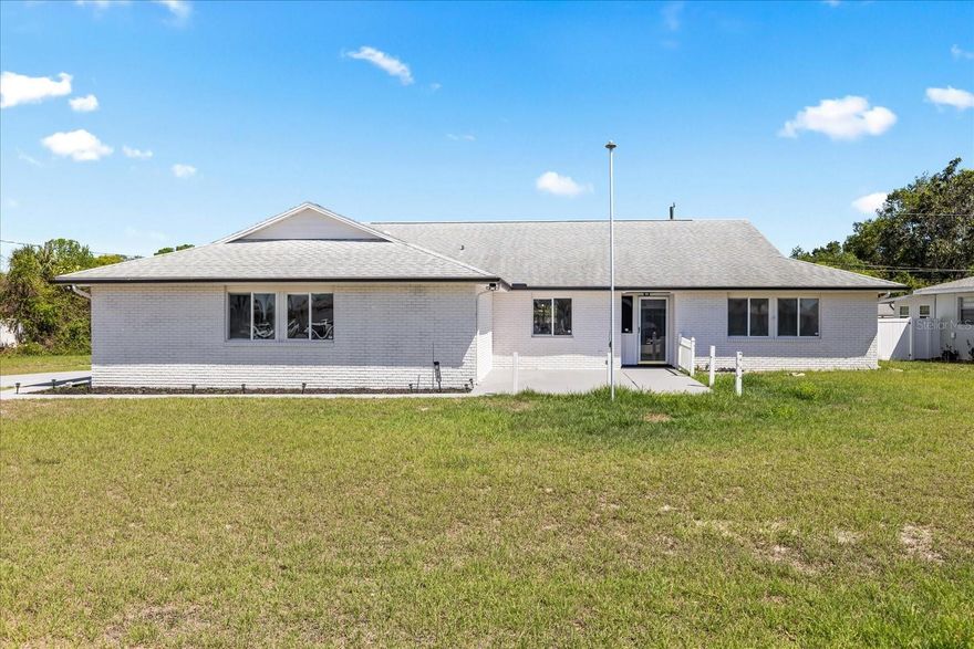 One or more photo(s) has been virtually staged. Rare find in Deltona! Turn-key single-family home offering 1,986 sq ft of living space (2,119 total sq ft) on an oversized 0.46-acre lot. This 4-bedroom, 2.5-bathroom home features an open-concept layout ideal for modern living.

Recent updates include new A/C, new water heater, new roof, new appliances, updated kitchen and bathrooms, new flooring, and fresh interior and exterior paint — making this home truly move-in ready.

The expansive lot provides plenty of space for outdoor living, entertaining, or future additions.

Seller offering $5,000 toward buyer’s closing costs. No HOA.

Conveniently located near shopping, dining, and major roadways.