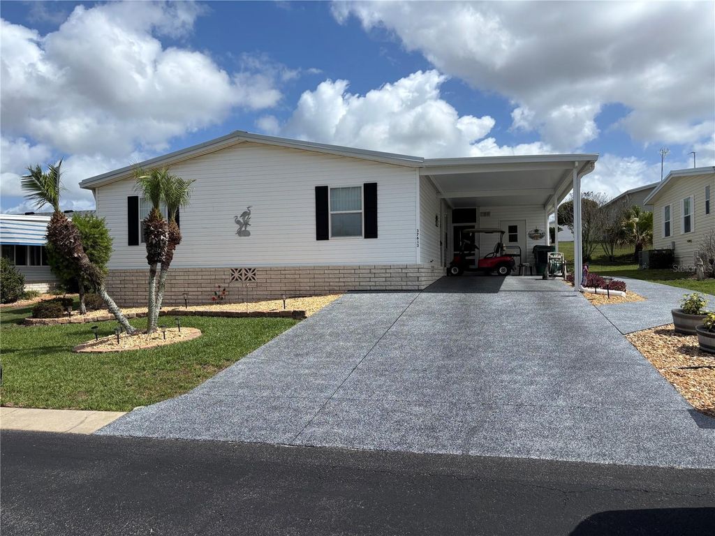 Photo of 37613 Neukom Avenue, Zephyrhills, FL 33541 (MLS # TB8497143)