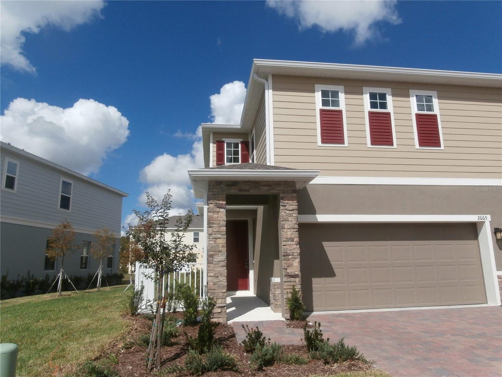 Photo of 2665 Pleasant Cypress Circle, Kissimmee, FL 34741 (MLS # O6441581)