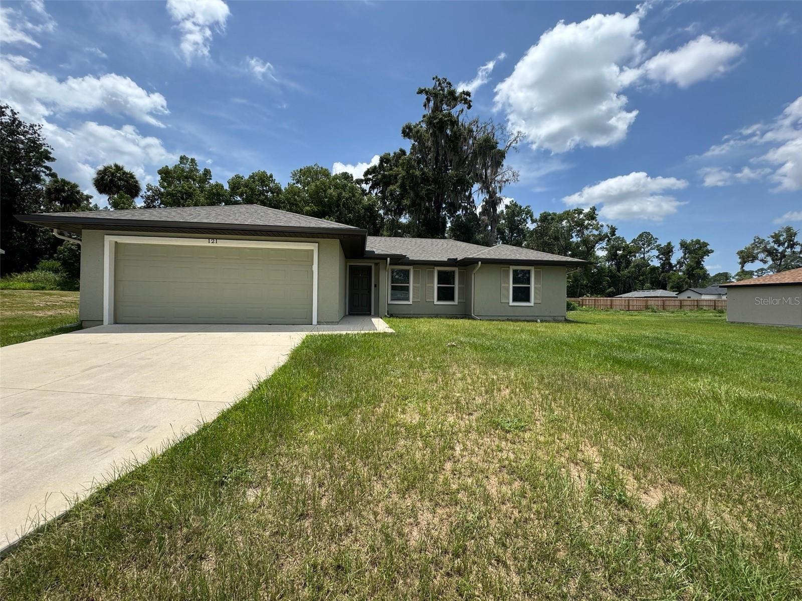 Welcome to your new beginning in the heart of Williston, Florida! This charming 3-bedroom, 2-bathroom home, built in 2021, spans 1,354 Sq Ft Heated and Cooled/1,702 Total Sq Ft, on a spacious 0.41-acre lot, offering modern comfort and room to grow. Step inside to find an open-concept layout with carpet in the living areas, and LVP flooring in the kitchen and bathrooms. The kitchen featuring a breakfast nook, and is combined with a bright living area—perfect for entertaining or cozy nights in. Enjoy the expansive backyard, ideal for gardening, play or just relaxing. Nestled in charming Williston, you’re just minutes from local shops and dining. Also close to local schools and just a half hour or less drive to Ocala, Gainesville, Chiefland, Newberry, and Archer. This home blends small-town charm with modern convenience. Don’t miss this gem—schedule your tour today.