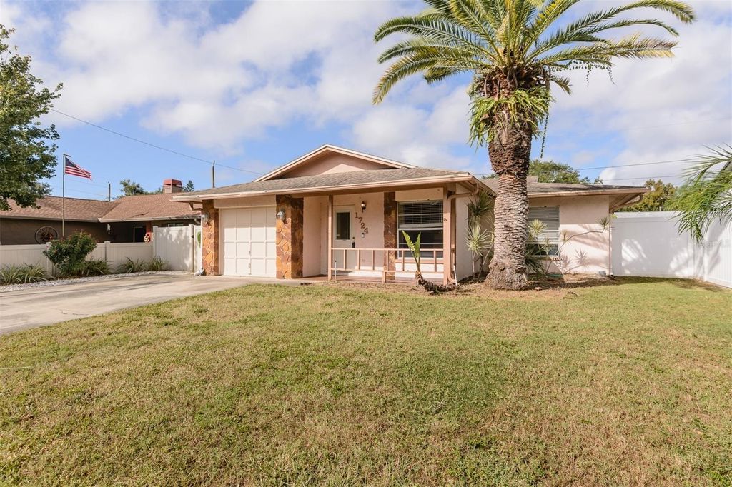 Photo of 1724 W Lagoon Circle, Clearwater, FL 33765 (MLS # TB8434893)