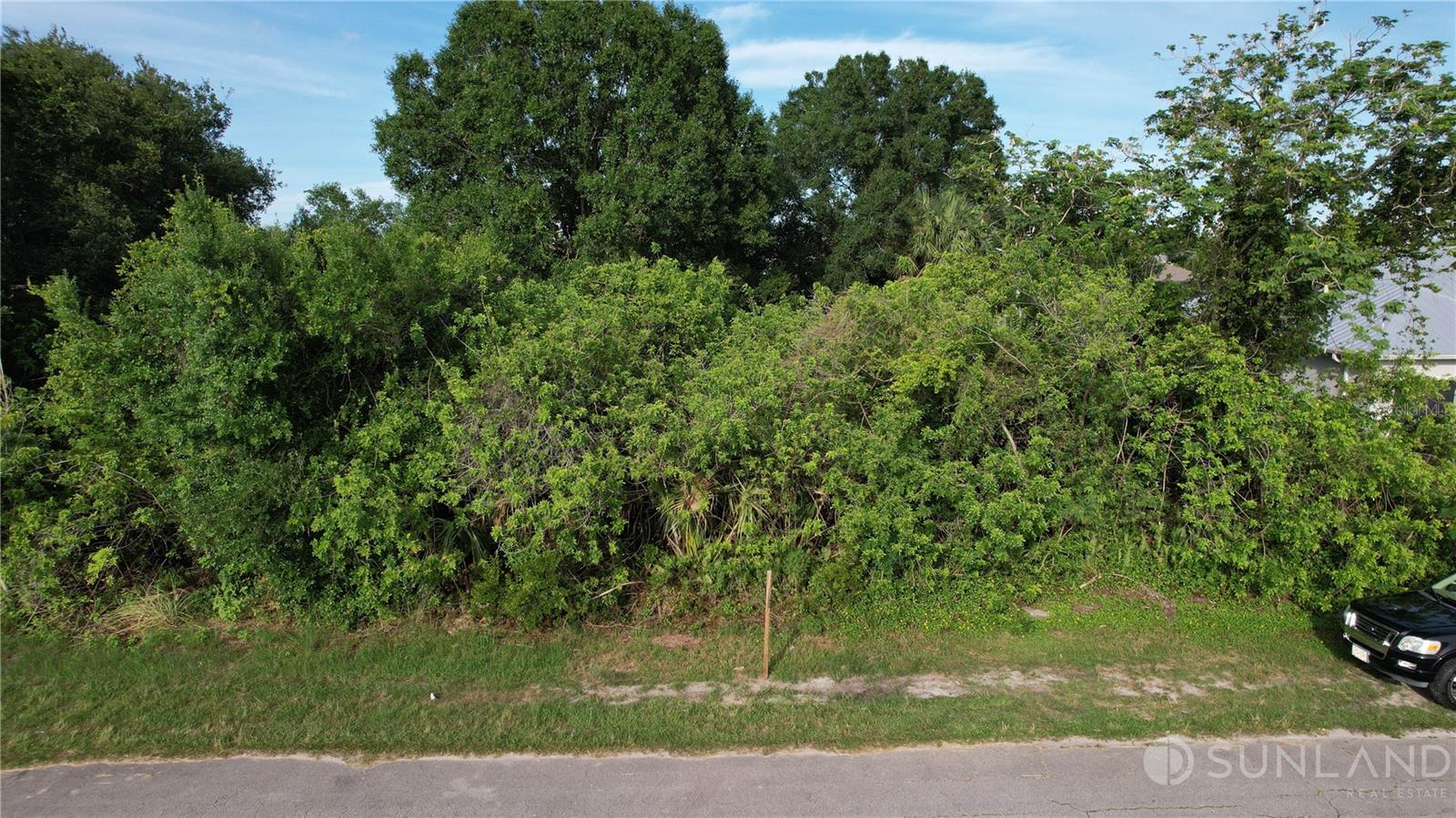 Presented by Sunland Real Estate: .23 acre wooded lot in in a well developed neighborhood. Neighborhood is quiet. Very close to SW Port Lucie Blvd. Also the Amazon Warehouse is on the other side of the interstate with a lot of development going on. This lot is high and dry. Perfect location for your next home.
