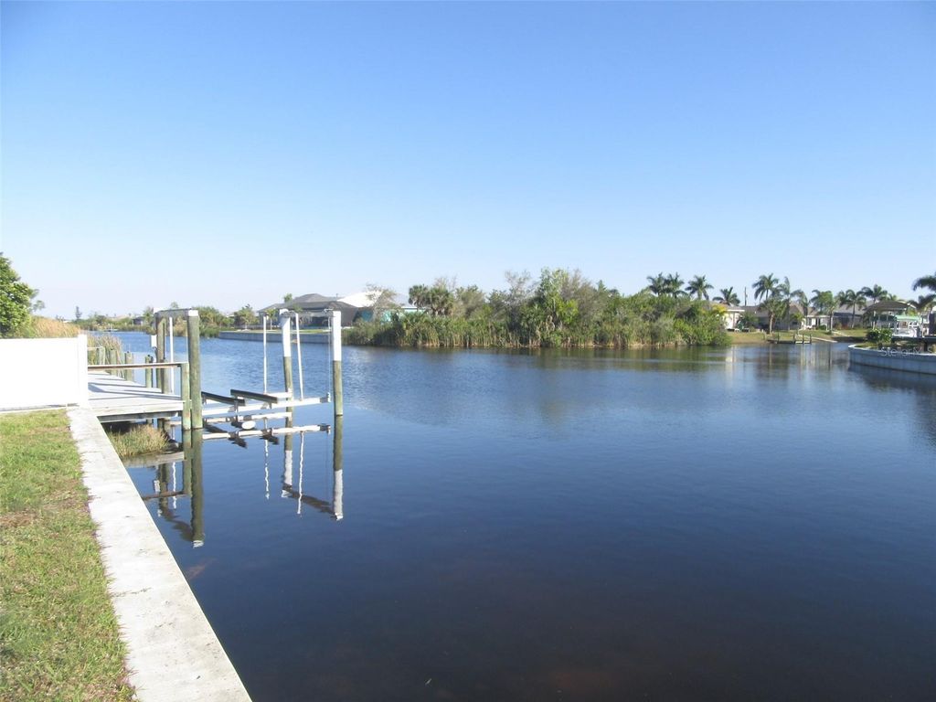 Photo of 9572 Singer Circle, Port Charlotte, FL 33981 (MLS # C7488661)