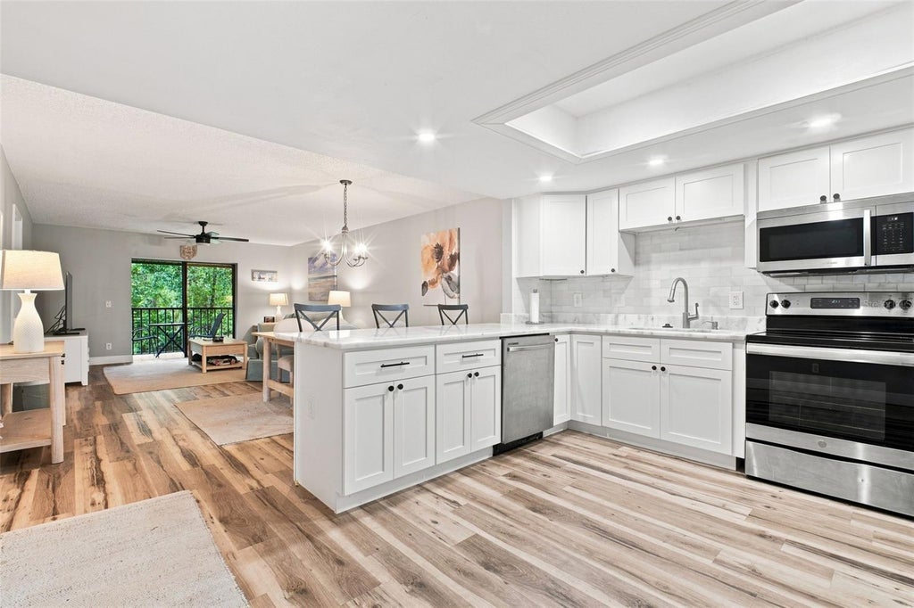 Photo of 1400 Tarpon Woods Boulevard #E6, Palm Harbor, FL 34685 (MLS # TB8541973)