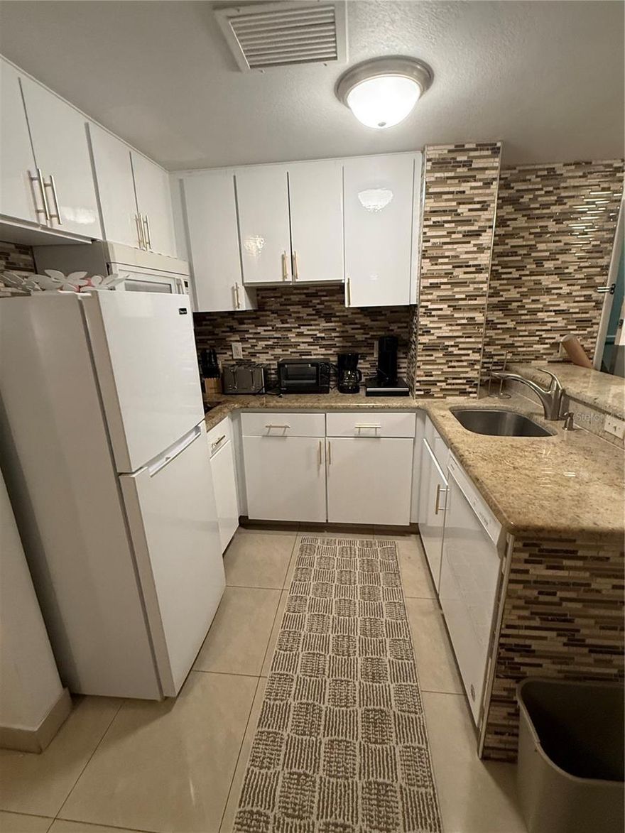 Seller Motivated,  this fully furnished 2-2-bedroom condo offers a great opportunity for short term rental income or personal use you have been waiting for! Completely turn key unit with all appliances, kitchenware, small appliances and linens so you can start renting or enjoying immediately. The resort boasts amenities including indoor and outdoor pools, a fitness center, a tennis court, and the best location close to theme parks, shopping, dining and entertainment. Maximize returns with flexible rental options where you can self manage or opt into the site rental program. All details have been taken care of for you. Don't miss this opportunity to own your piece of vacation paradise.